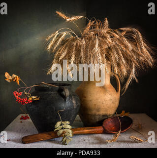 Autunno still life. vintage. spikelets di grano. Foto Stock
