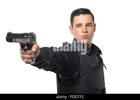 Poliziotto mira con una pistola, vista frontale Foto Stock