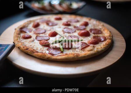 Pizza piccante Foto Stock