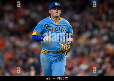 Agosto 10, 2018: Seattle Mariners primo baseman Ryon Healy (27) corre in panchina durante un Major League Baseball gioco tra Houston Astros e il Seattle Mariners su degli anni settanta la notte a Minute Maid Park a Houston, TX. I marinai ha vinto il gioco da 5 a 2.Trask Smith/CSM Credito: Cal Sport Media/Alamy Live News Foto Stock