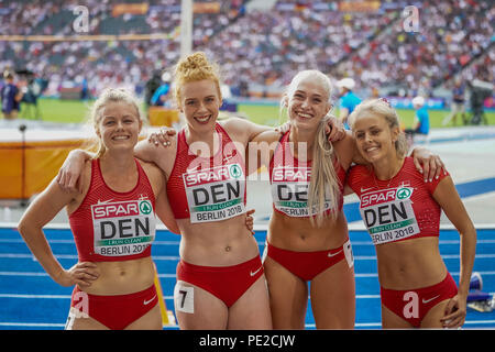 Berlino, Germania. Agosto 12, 2018: Mette Graversgaard di Â Danimarca, Ida Kathrine Karstoft di Â Danimarca, Mathilde Kramer di Â Danimarca e Louise Ã˜stergÃ¥rd del Â Danimarca durante 4 volte 100 metro finale per le donne, stabilendo un nuovo record nordica di 44.09 secondi presso lo Stadio Olimpico di Berlino con il Campionato Europeo di Atletica Leggera. Ulrik Pedersen/CSM Credito: Cal Sport Media/Alamy Live News Foto Stock