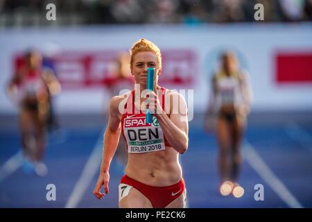 Berlino, Germania. Agosto 12, 2018: Mette Graversgaard di Â Danimarca, Ida Kathrine Karstoft di Â Danimarca, Mathilde Kramer di Â Danimarca e Louise Ã˜stergÃ¥rd del Â Danimarca durante 4 volte 100 metro finale per le donne, stabilendo un nuovo record nordica di 44.09 secondi presso lo Stadio Olimpico di Berlino con il Campionato Europeo di Atletica Leggera. Ulrik Pedersen/CSM Credito: Cal Sport Media/Alamy Live News Foto Stock