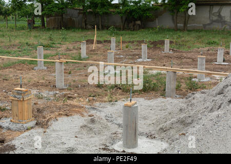 Costruzione di palo di fondazione. Una serie di foto la costruzione di case. Foto Stock