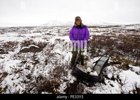 Fotografo Outdoor Øyvind Martinsen nel Dovrefjell national park, Dovre, Norvegia. Foto Stock