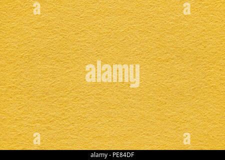 Giallo superficie feltro extreme close up. Macro di grande consistenza e lo sfondo Foto Stock