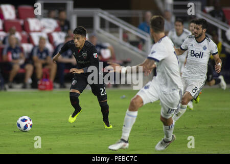 Washington, Distretto di Columbia, Stati Uniti d'America. 14 Luglio, 2018. D.C. Regno centrocampista Yamil Asad (22) dribbling durante il gioco tra D.C. Regno e Vancouver Whitecaps presso Audi Archiviato in Washington, DC il 14 luglio 2018. D.C. Si tratta di D.C. Regno del primo gioco in campo Audi. Credito: Alex Edelman/ZUMA filo/Alamy Live News Foto Stock