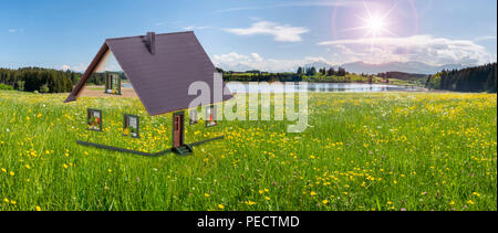 Modello di casa nel bellissimo paesaggio Foto Stock