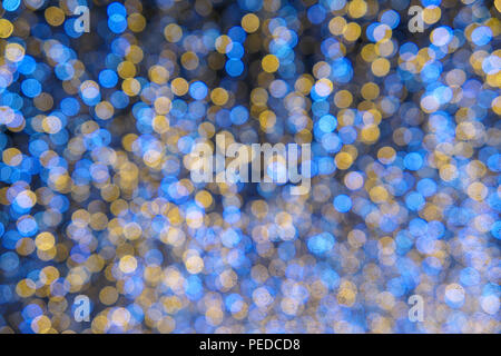 Abstract bokeh di luci in giallo e blu Foto Stock