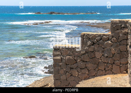 Muro di pietra sulla estremità sud di Fuerteventura Foto Stock