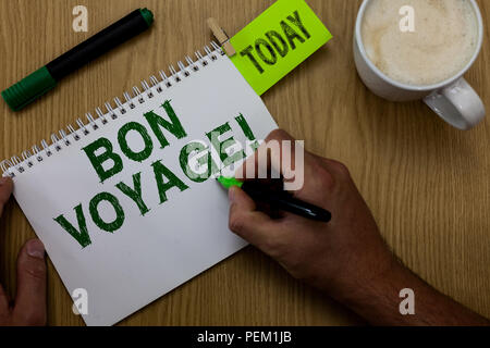 Conceptual la scrittura a mano che mostra Bon Voyage. Business photo vetrina usato esprimere i miei buoni auspici a qualcuno sul set off sul viaggio uomo marcatore di contenimento Foto Stock