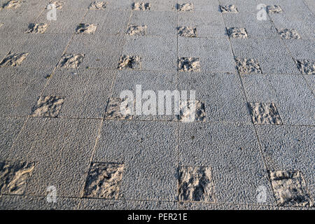 Abstract pavimentazione di pietra, lato texture illuminato sul pavimento Foto Stock