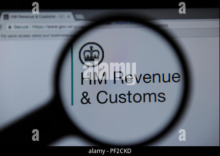 Il sito web HMRC visto attraverso una lente di ingrandimento Foto Stock