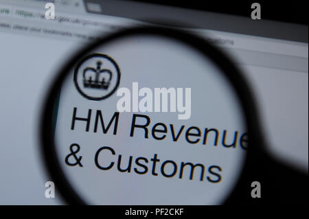 Il sito web HMRC visto attraverso una lente di ingrandimento Foto Stock