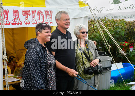 Beaminster, Dorset, Regno Unito. 19 agosto 2018. Regno Unito Meteo. Attore Martin Clunes a Buckham Fiera a Beaminster, Dorset. Credito Foto: Graham Hunt/Alamy Live News Foto Stock