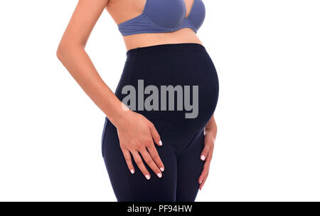 Pantaloni per le donne in gravidanza. Fascia elastica speciale per l'addome. Foto Stock