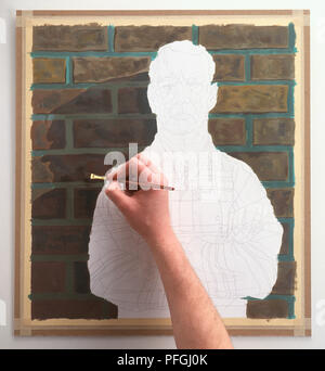 Riempimento a mano in Sfondo mattone sul contorno di disegno di un uomo Foto Stock