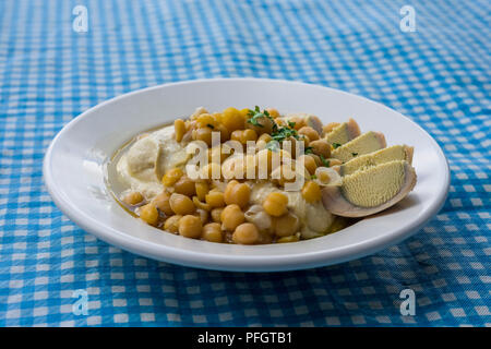 Hummus con olio di oliva Foto Stock