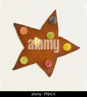 A forma di stella biscotto decorato con multi-colore rivestite di zucchero dolci Foto Stock