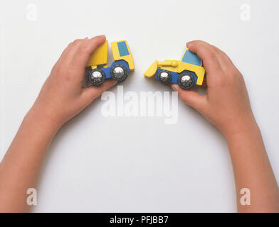 Mani toy autocarro E SCAVATRICE Foto Stock