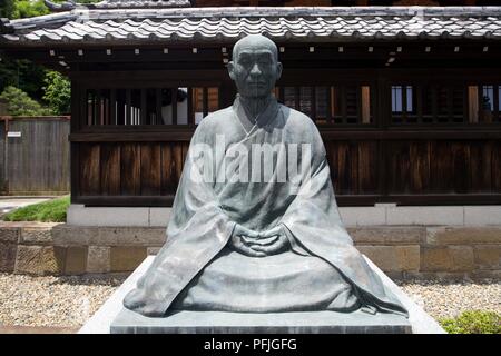 Giappone, Tokyo, Minato-ku, Sengaku-ji, statua del maestro Zen Kodo Sawaki Roshi Foto Stock