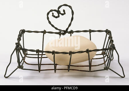 Filo rack di sapone, a forma di cuore, design azienda barra di sapone. Foto Stock