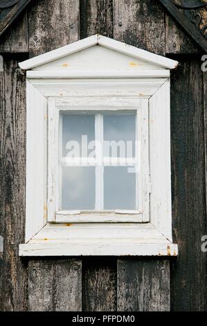 L'Islanda, Reykjavik, Arbaejarsafn, finestra in una tradizionale casa in legno Foto Stock