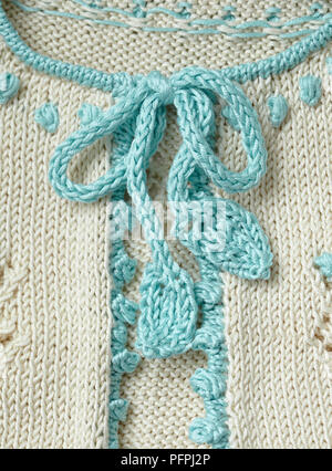 Bambino in maglia della giacca bolero, dettaglio Foto Stock