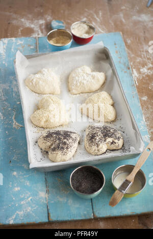A forma di cuore ad seminate rotoli Foto Stock