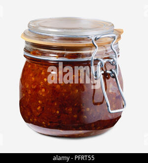 Il vasetto di vetro di peperoncino rosso (salsa Harissa) Foto Stock
