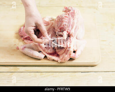 Debone pollo. Fase 5 Foto Stock