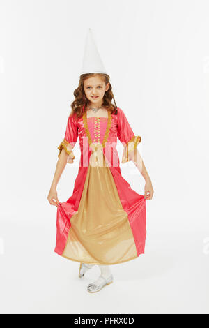 Ragazza vestita come la principessa in rosa Abito in raso Foto Stock