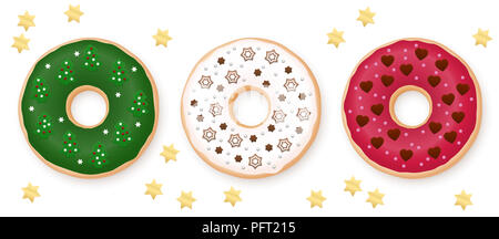 Ciambelle di Natale set. Verde, bianco e rosso a ciambella decorata con dolci fondenti di festosa - cioccolato, marzapane e zucchero stelle, abeti, fiocchi di neve. Foto Stock