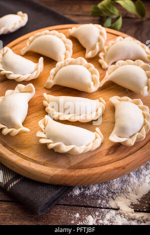 Pelmeni, vareniki, cottura, Russo cucina tradizionale Foto Stock