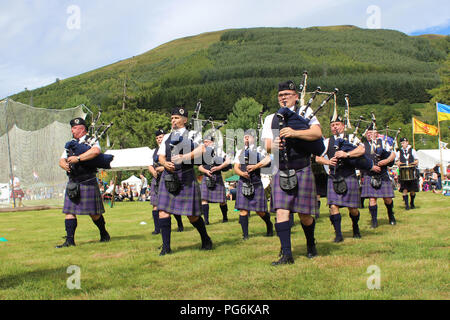 CRIEFF Scozia, 21 luglio 2018: Il Badenoch Strathspey & Pipe Band eseguire a Lochearnhead Highland Games vicino a Crieff in Scozia. Essi sono un gra Foto Stock