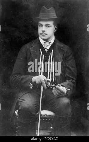 Re Manuel seduto con la canna da zucchero Foto Stock