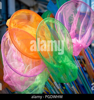 Bambini reti da pesca in mare Foto Stock