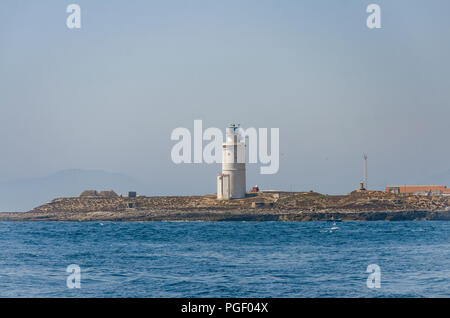 Faro del xviii secolo a Tarifa il punto, la Isla de las palomas, Costa de la Luz, Andalusia, Spagna. Foto Stock