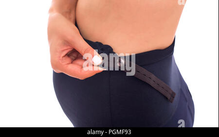 Pantaloni per le donne in gravidanza. Si può vedere la fascia elastica che regola la vita. Foto Stock