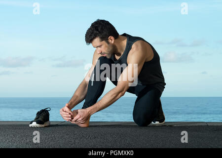 Atleta con lesioni del piede Foto Stock