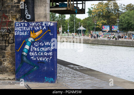 Arte di strada lungo il canale Ourcq a Parigi, Francia. Foto Stock