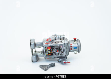 Il Robot con la chiave Foto Stock