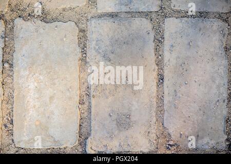 La consistenza del mattone per passerelle. grigio , foto di tre mattoni di forma rettangolare Foto Stock