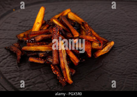 Melanzane Arrosto heap snak topping Foto Stock