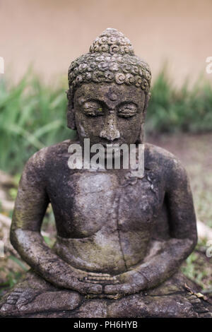 Vecchia divinità balinese statua Foto Stock