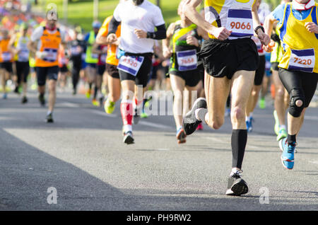 Guide di scorrimento per le zampe durante una maratona Foto Stock