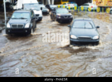 Inondati city road. Lens Blur Foto Stock