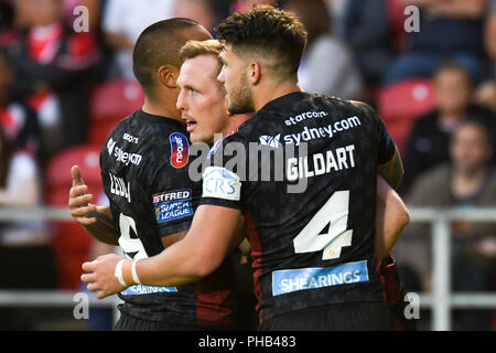 St Helens, Regno Unito. Il 31 agosto 2018. Totalmente Wicked Stadium, St Helens, Inghilterra; Betfred Super League Super 8's , St Helens v Wigan Warriors ; Dan Sarginson di Wigan Warriors celebra la sua prova a credito: News immagini /Alamy Live News Foto Stock