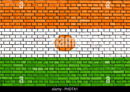 Bandiera del Niger dipinta su un muro di mattoni Foto Stock
