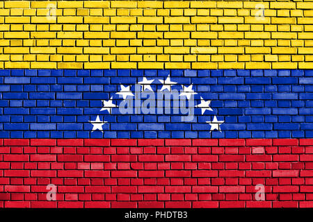 Bandiera del Venezuela dipinta su un muro di mattoni Foto Stock