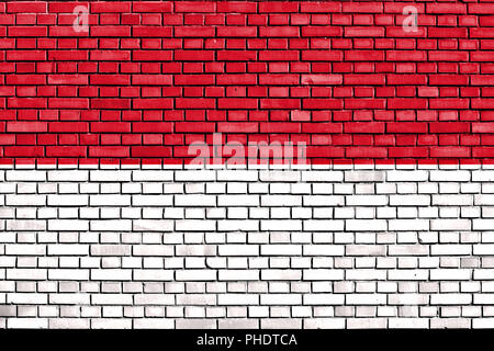 Bandiera di Indonesia dipinta su un muro di mattoni Foto Stock